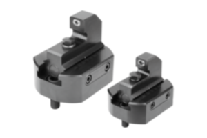 Fixed stop with grip insert for draw-down clamping system Fixed stop with grip insert for draw-down clamping system
