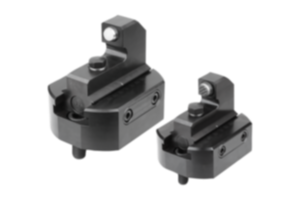Fixed stop with swivel insert for draw-down clamping system Fixed stop with swivel insert for draw-down clamping system